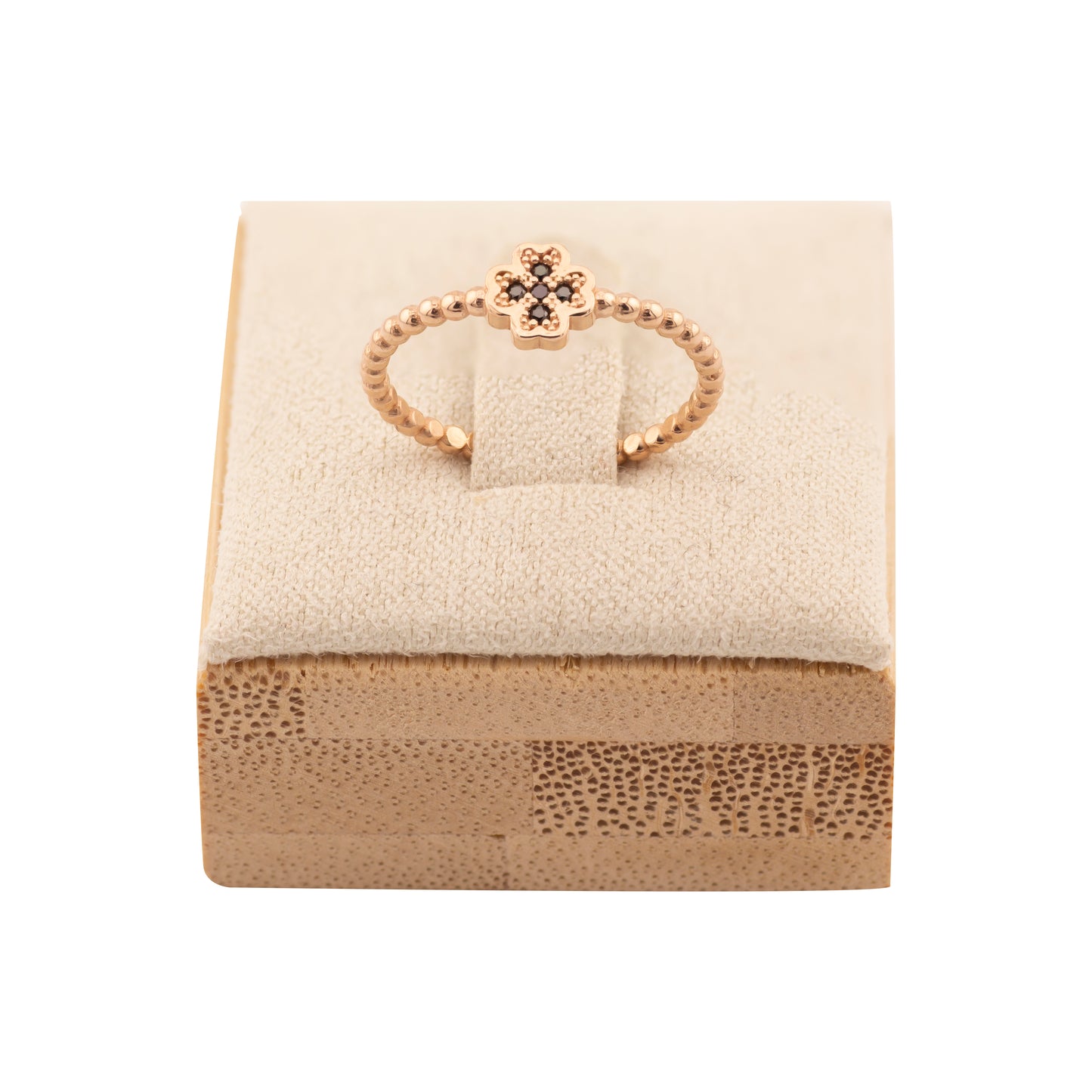 Rožinio aukso žiedas su apvalių elementų juostele ir gėlės formos detalė centre, dekoruota smulkiais cirkoniais