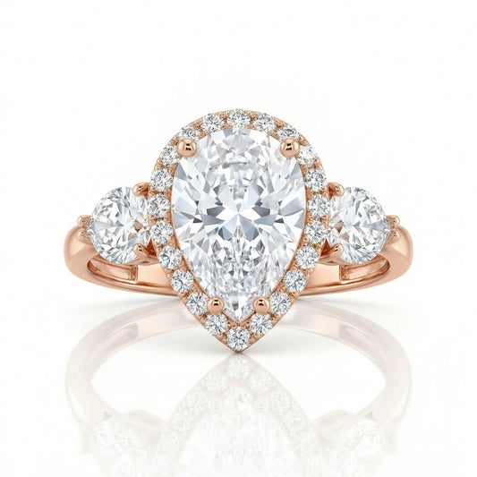 Auksinis lašo formos žiedas su cirkoniais